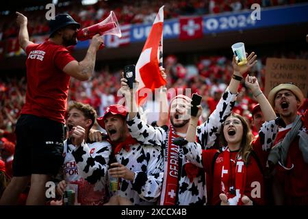 Cologne, Germany. 15 June 2024. Fans of Switzerland show their support prior to the UEFA EURO 2024 group stage football match between Hungary and Switzerland. Credit: Nicolò Campo/Alamy Live News Stock Photo