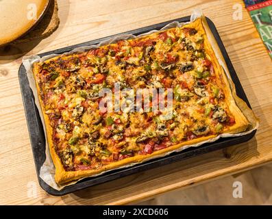 Home made ham and mixed vegetable pizza, UK Stock Photo