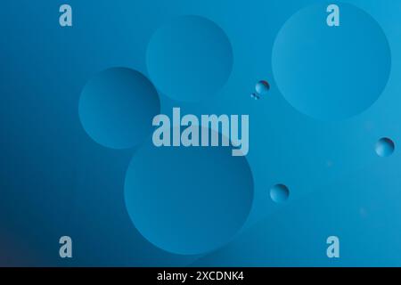 Abstract blue background with dynamic circles of different sizes Stock Photo