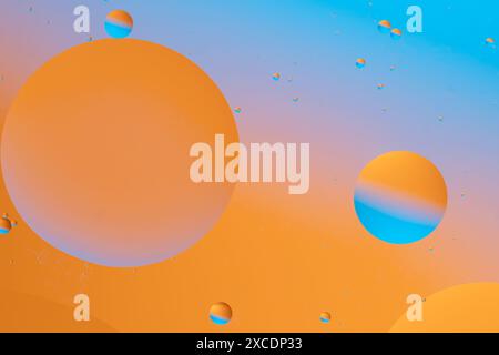 Abstract spheres floating on a gradient background Stock Photo