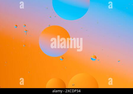 Colorful circles floating on a gradient background Stock Photo