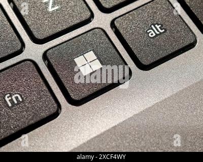 New Microsoft Windows 11 logo on a computer OS key, laptop keyboard macro detail, extreme closeup shot, nobody, no people. Windows operating system up Stock Photo