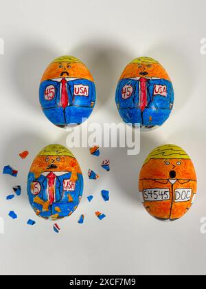 Cartoonish drawings on eggs crack and peel, showing the 45th 'eggs' president transforming from candidate to convict in orange jumpsuit. Stock Photo