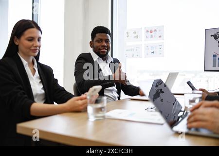 Diverse business team having a meeting in a modern office Stock Photo