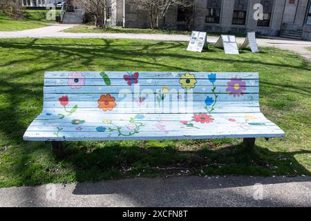 Decorated wooden bench in downtown Halifax, Nova Scotia, Canada Stock Photo