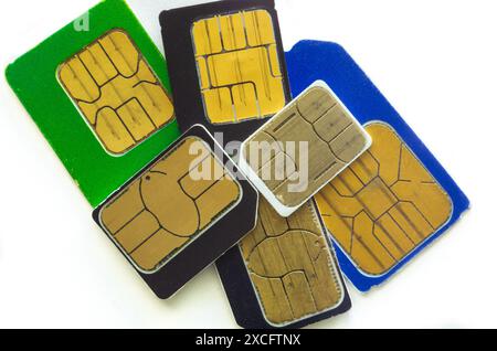 Six SIM cards on a white background closeup Stock Photo