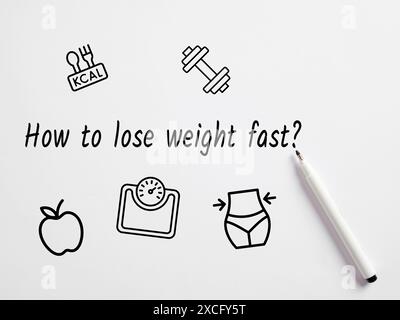Dieting and weight loss concept. The question of how to lose weight fast handwritten with a pen on white background. Stock Photo