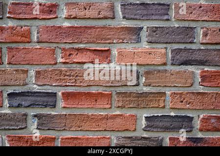 A brick and cement wall Stock Photo