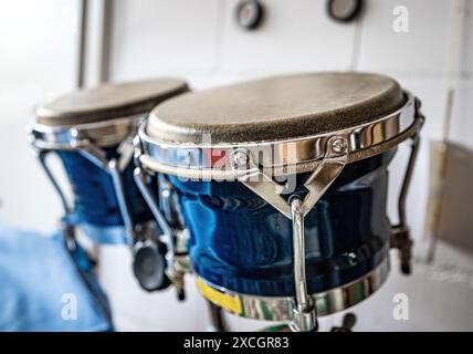 Blue drums in recording studio for hard beat perfomance closeup. Professional musical instrument for rock concerts Stock Photo