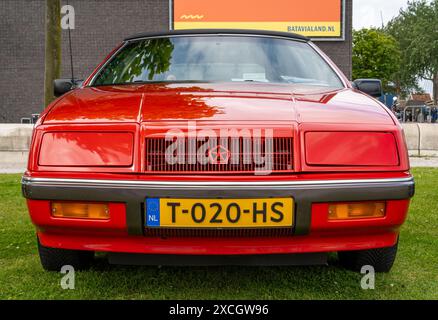 Lelystad, The Netherlands, 16.06.2024, Front view of personal luxury car Chrysler LeBaron, 3rd generation from 1990 at The National Old timer Day Stock Photo