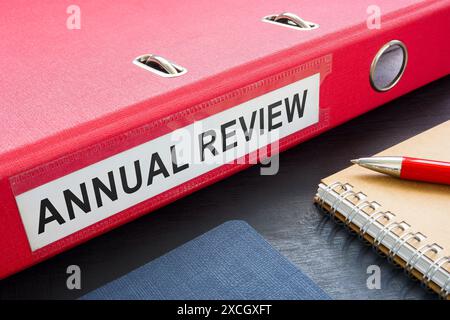 Big folder with annual review and notebooks. Stock Photo