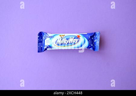 KYIV, UKRAINE - APRIL 20, 2024 Milky Way or MilkyWay small chocolate bar. Milky Way bars is worldwide famous product since 1924 Stock Photo