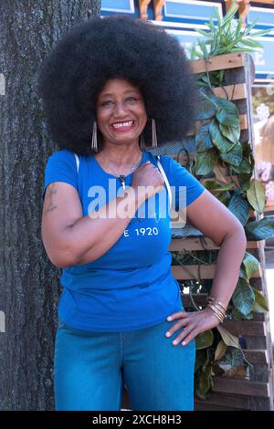 An attractive middle aged woman with a terrific Afro hairdo at the annual Juneteenth Parade in Peekskill,, New York. Stock Photo