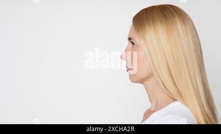 Woman With Blonde Hair Looking to the Right Stock Photo