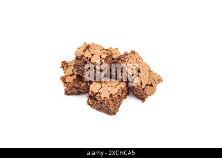 Sponge cake with chocolate filling cut in squares piled up isolated on  white Stock Photo