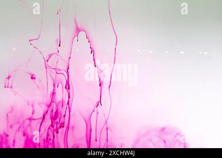 Billowing clouds of fluid with pink color Stock Photo