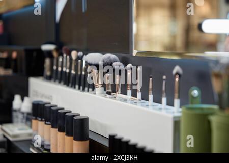 Set of brushes for make-up different sizes in cosmetics store Stock Photo