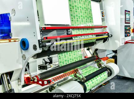 Automatic packing tape machine for Packing manufacturing ,Modern machine for packaging line in factory, Industrial and technology concept. Stock Photo