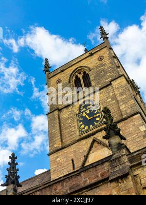 The clock tower on St Johns Church in Knaresborough North Yorkshire England UK. The clock face was erected in 1884 and the church is 12th century. Stock Photo