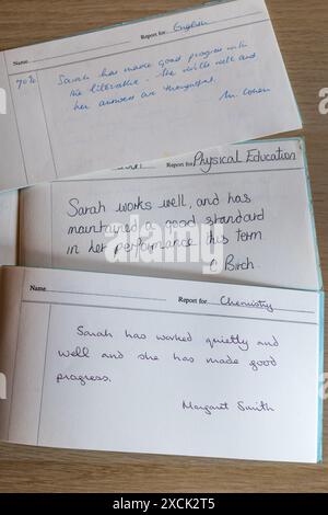 Handwritten secondary school education report cards for English, PE and Chemistry subjects dating from 1970s UK Stock Photo