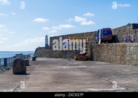 An RNLI transit van parks on Porthcawl pier as they prepare for RNLI rescue display at Rescue Fest 2024 , Porthcawl UK. 16th June 2024. Stock Photo