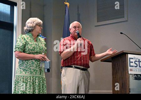 WICHITA, KANSAS - JUNE 15, 2024 Congressman Ron Estes (R-KS) stands with his wife Susan Estes on stage during a fundraiser rally in his bid for re-election to the 4th congressional seat. Stock Photo