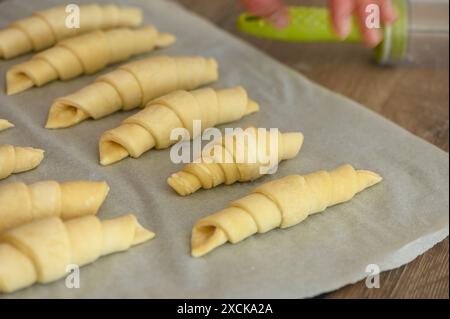 Close up croissant dough with egg wash 1 Stock Photo