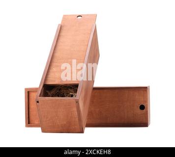 Open wooden wine boxes with straw isolated on white Stock Photo - Alamy