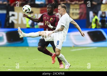 Frankfurt, Germany. 17th June, 2024. Belgium's Johan Bakayoko and Slovakia's Ondrej Duda fight for the ball during a soccer game between Belgian national soccer team Red Devils and Slovakia, Monday 17 June 2024 in Frankfurt Am Main, Germany, the first match in the group stage of the UEFA Euro 2024 European championships. BELGA PHOTO BRUNO FAHY Credit: Belga News Agency/Alamy Live News Stock Photo