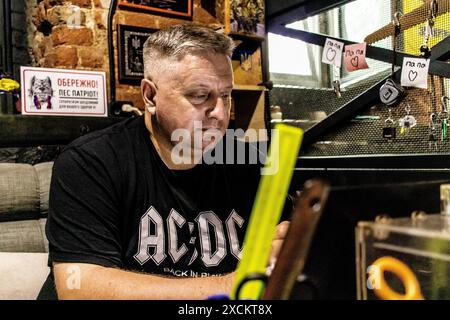 Kharkiv, Ukraine, June 17, 2024 Volunteers from the Palyanica charity organization cook homemade meals for Ukrainian soldiers. Some dishes are cooked Stock Photo