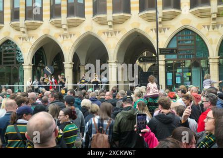 Northampton Saints Rugby team winners champions win trophy award best teams parade crowds Mayor Mayoress Town Hall people waving bus tour crowds sing Stock Photo