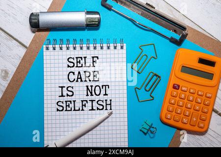 self care is not selfish inspirational reminder - handwriting on sticky notes, body positive, mental health and personal development slogan Stock Photo