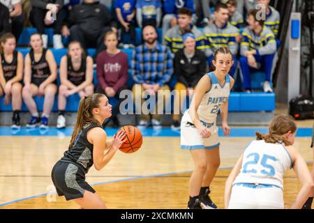 A Blackhawk Christian player attempts a free-throw during a girls' high school basketball game at Lakewood Park Christian near Auburn, Indiana, USA. Stock Photo