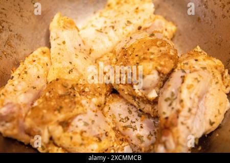 Seasoned Raw Chicken wings to be air fried Stock Photo