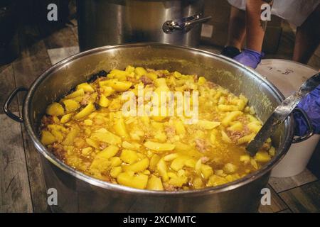 Kharkiv, Ukraine, June 17, 2024 Closeup of the work in the kitchen of volunteers from the Palyanica charity organization preparing different types of Stock Photo