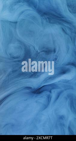 Blue color dust particles splash on white background Stock Photo - Alamy