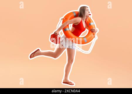 Running female beach rescuer with lifebuoy and first aid kit on beige background Stock Photo