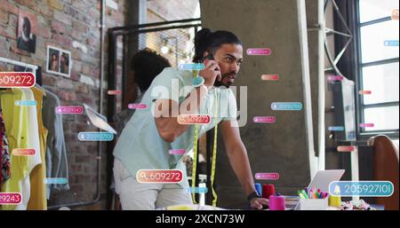 Image of social media icons over biracial businessman Stock Photo