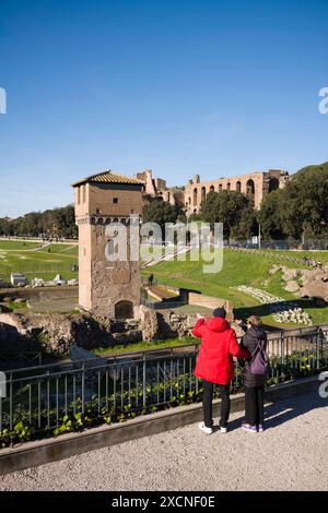 Rome. Italy. Circo Massimo (Circus Maximus) with the medieval Torre della Moletta in the foreground and remains of the imperial palaces on the Palatin Stock Photo