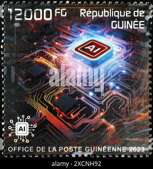 Artificial intelligence symbolized on stamp of Guinea Stock Photo