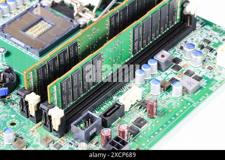 Workstation or computer server repair, Installs the equipment - ECC memory ( ram ) inserting locked, Computer repair concept Close-up view, Hardware. Stock Photo