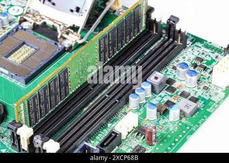 Workstation or computer server repair, Installs the equipment - ECC memory ( ram ) inserting locked, Computer repair concept Close-up view, Hardware. Stock Photo