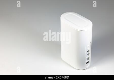 dual band wi-fi 6 router on white table. Stock Photo