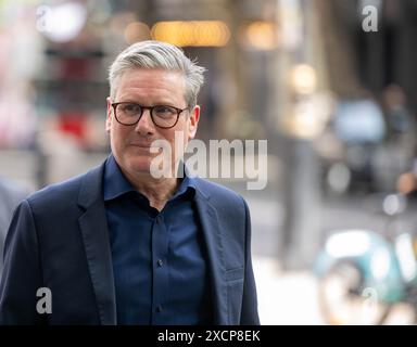 London, UK. 18th June, 2024. Sir Kier Starmer, Leader of the Labour Party leaves Global radio after an interview Credit: Ian Davidson/Alamy Live News Stock Photo