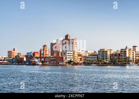 Kaohsiung, Taiwan - April 29, 2019: Cijin Island skyline. Scenic view of Kaohsiung Harbor and the Cijin Ferry Pier. Amazing cityscape. Stock Photo