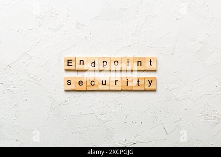 endpoint security word written on wood block. endpoint security text on table, concept. Stock Photo