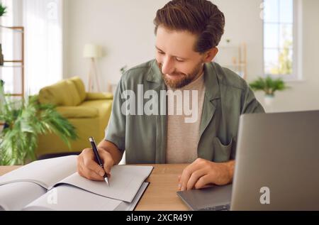 Positive Student Studying Or Working Remotely Stock Photo