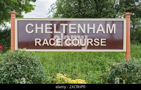 Signage for 'Cheltenham Race Course' at he railway station of  Gloucestershire & Warwickshire steam railway that runs from Broadway in the Cotswolds. Stock Photo