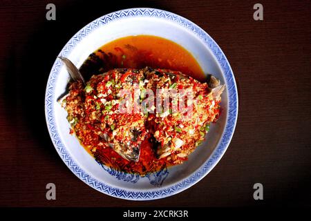 The Fish head with chopped pepper is a Taiwanese delicacy and a Sichuan delicacy Stock Photo