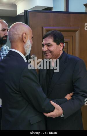 Tehran, Iran. 17th June, 2024. Iranian acting president MOHAMMAD MOKHBER (R) visits HAMID NOURI (L), who was imprisoned in Sweden, in Tehran. European Union diplomat Johan Floderus and another man, Saeed Azizi, were released by Iran in exchange for Iranian national Hamid Nouri, who was convicted in Stockholm of committing war crimes over his part in 1988 mass executions in the Islamic Republic. (Credit Image: © Iranian Presidency via ZUMA Press Wire) EDITORIAL USAGE ONLY! Not for Commercial USAGE! Stock Photo